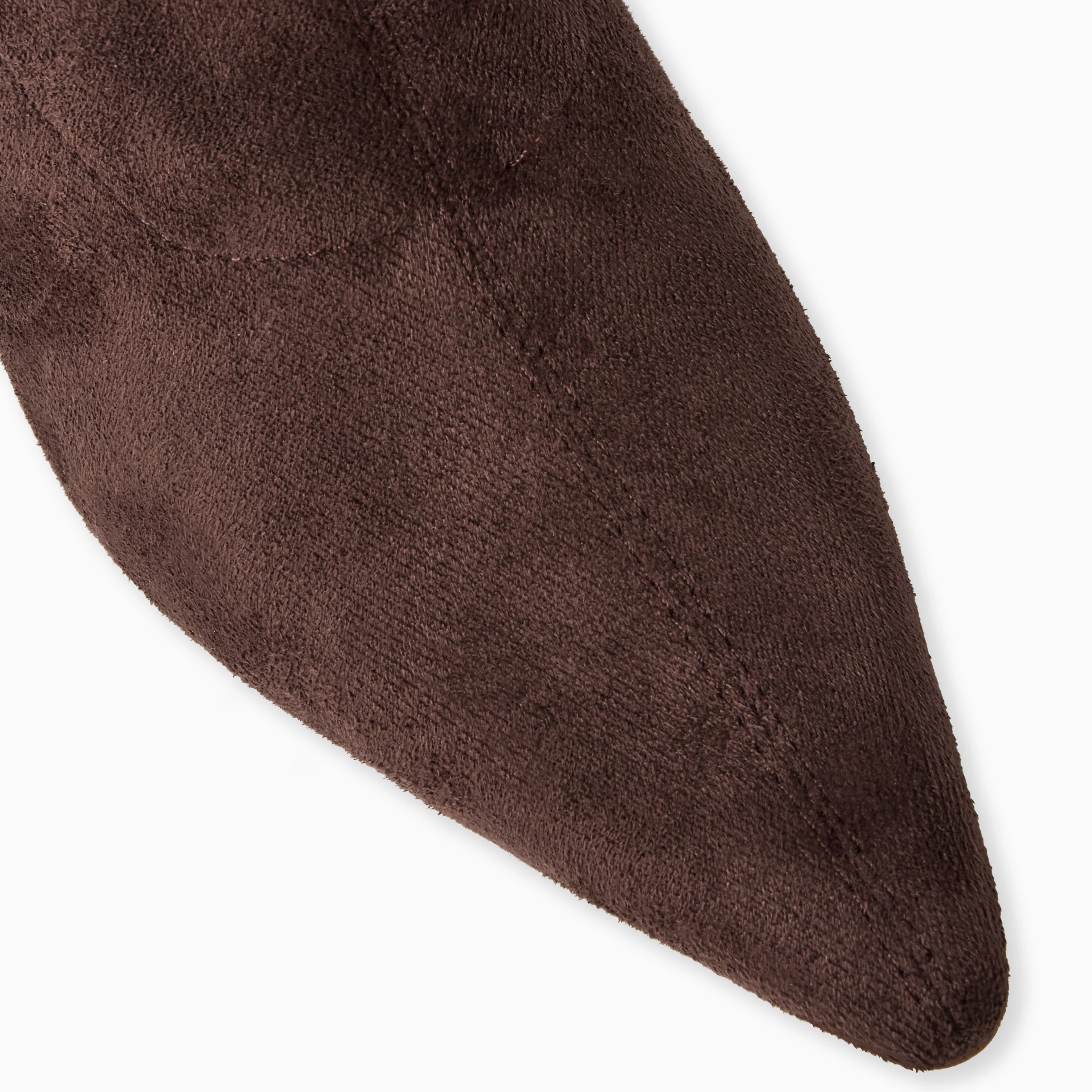 Brown shoe sole on a white background