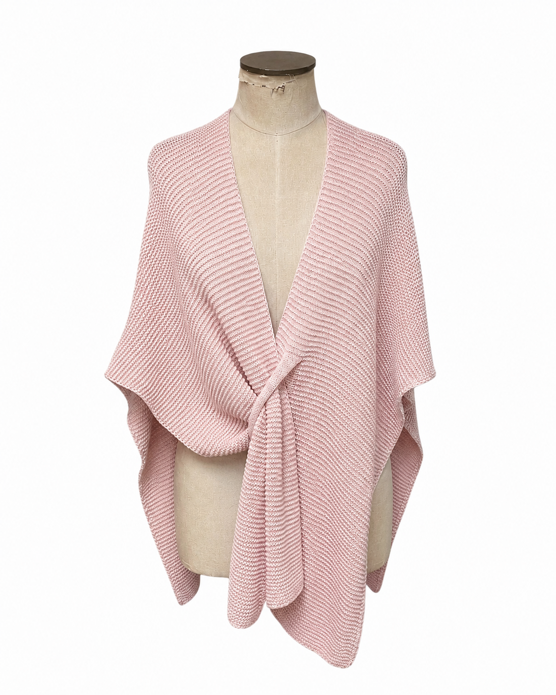 A light pink ribbed knit wrap poncho