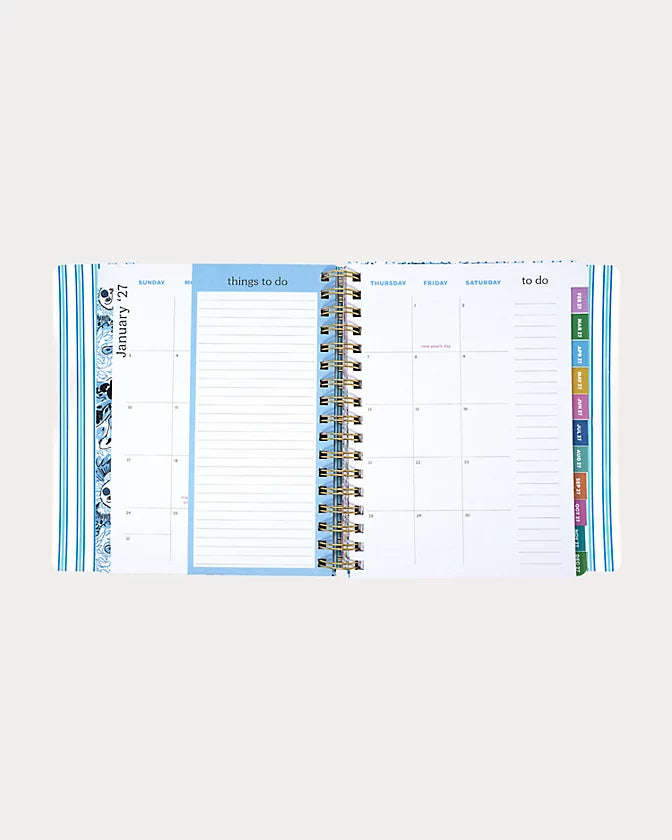 Navy blue Lilly Pulitzer 2026-2027 17 Month Leatherette Agenda with white shell patterns in Resort White Shell Shine