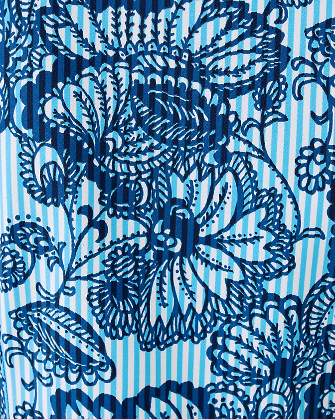 Blue floral pattern on a blue striped background