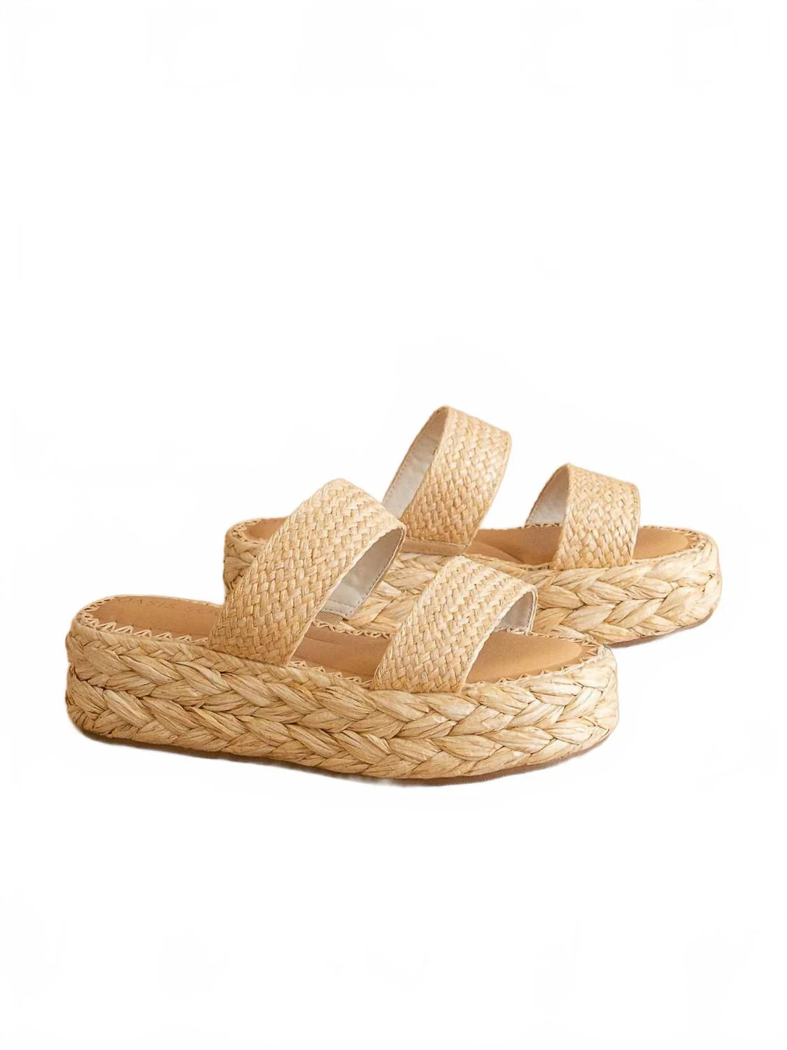Pair of woven sandals on a white background