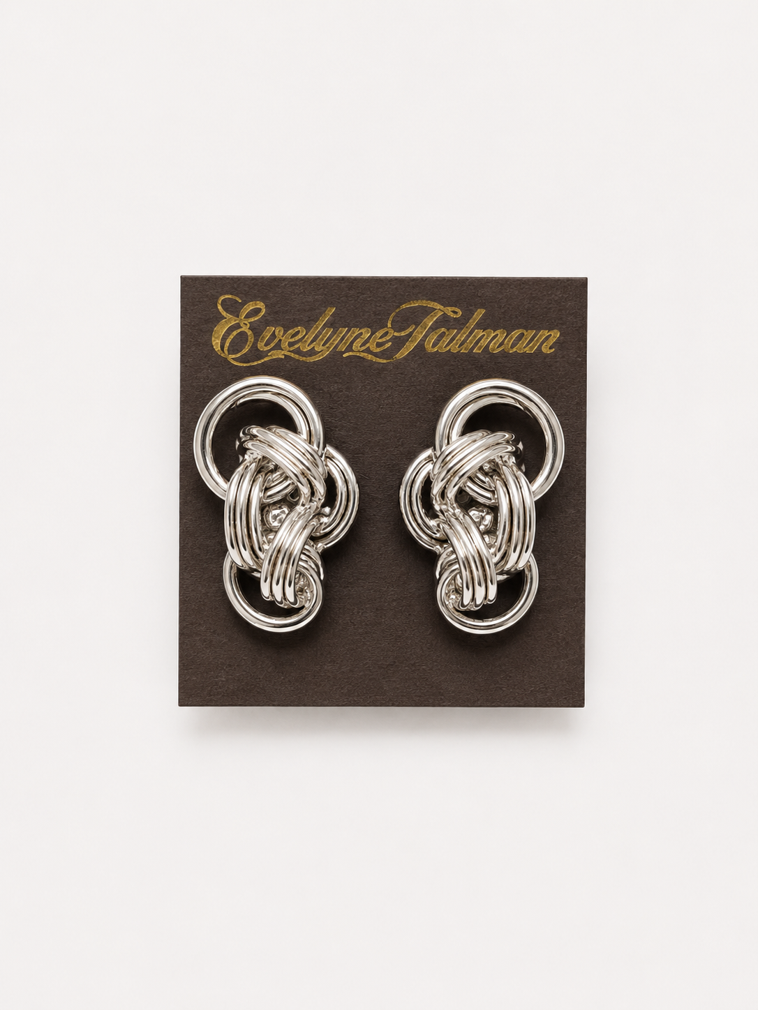 Silver Chain Clip-on Earrings pair of silver-toned interwoven knot earrings