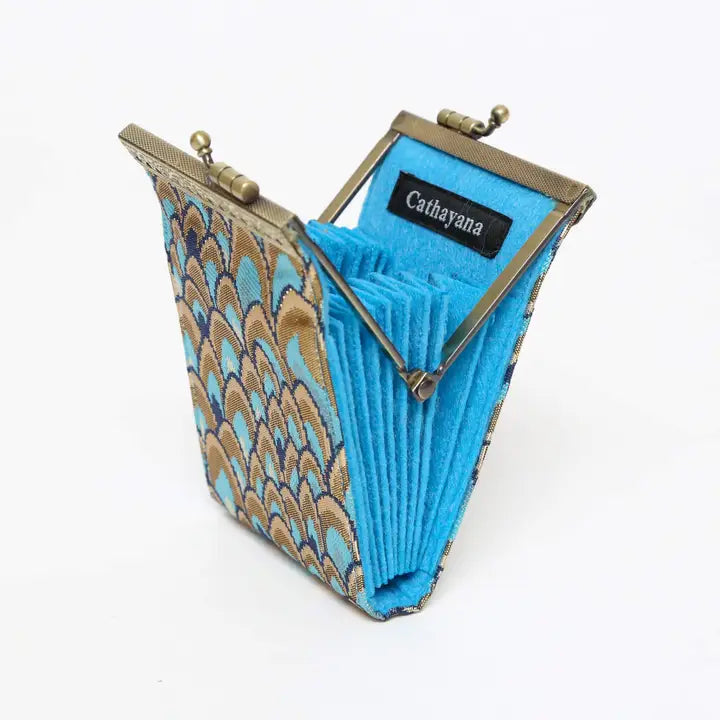 Blue and brown patterned clutch bag with &