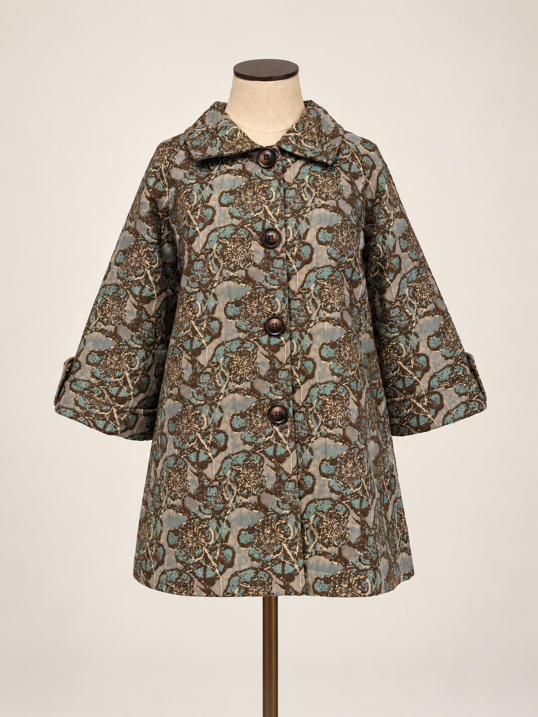 Taupe & Teal Brocade Jacket a short-sleeved button-front coat with an intricate brown, beige, and gray paisley pattern.
