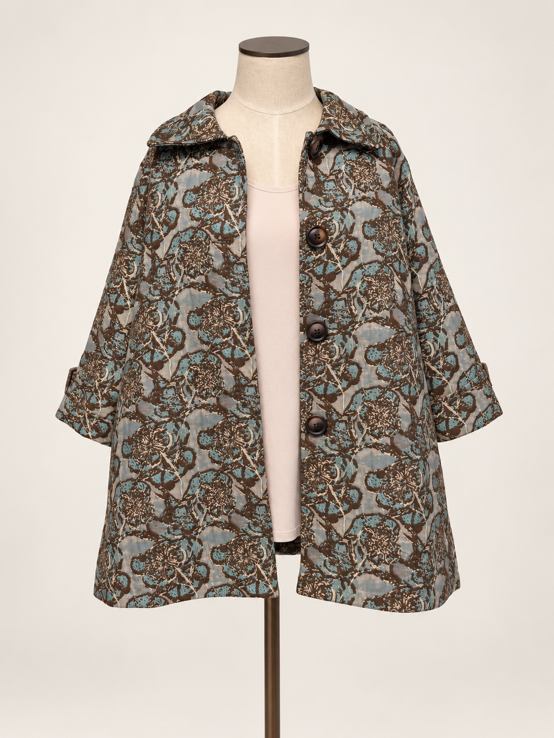 Taupe & Teal Brocade Jacket a short-sleeved button-front coat with an intricate brown, beige, and gray paisley pattern.