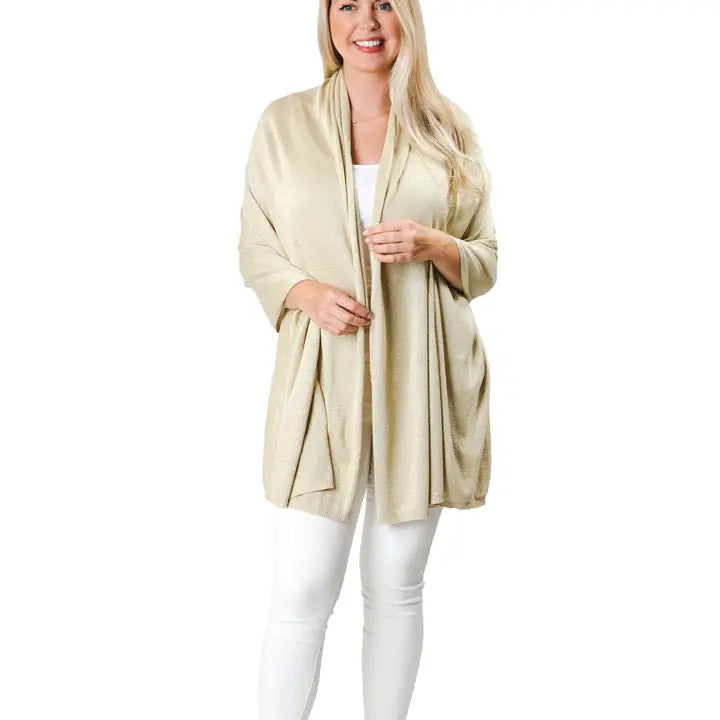 Woman wearing a beige Ari Bamboo Shawl Wrap