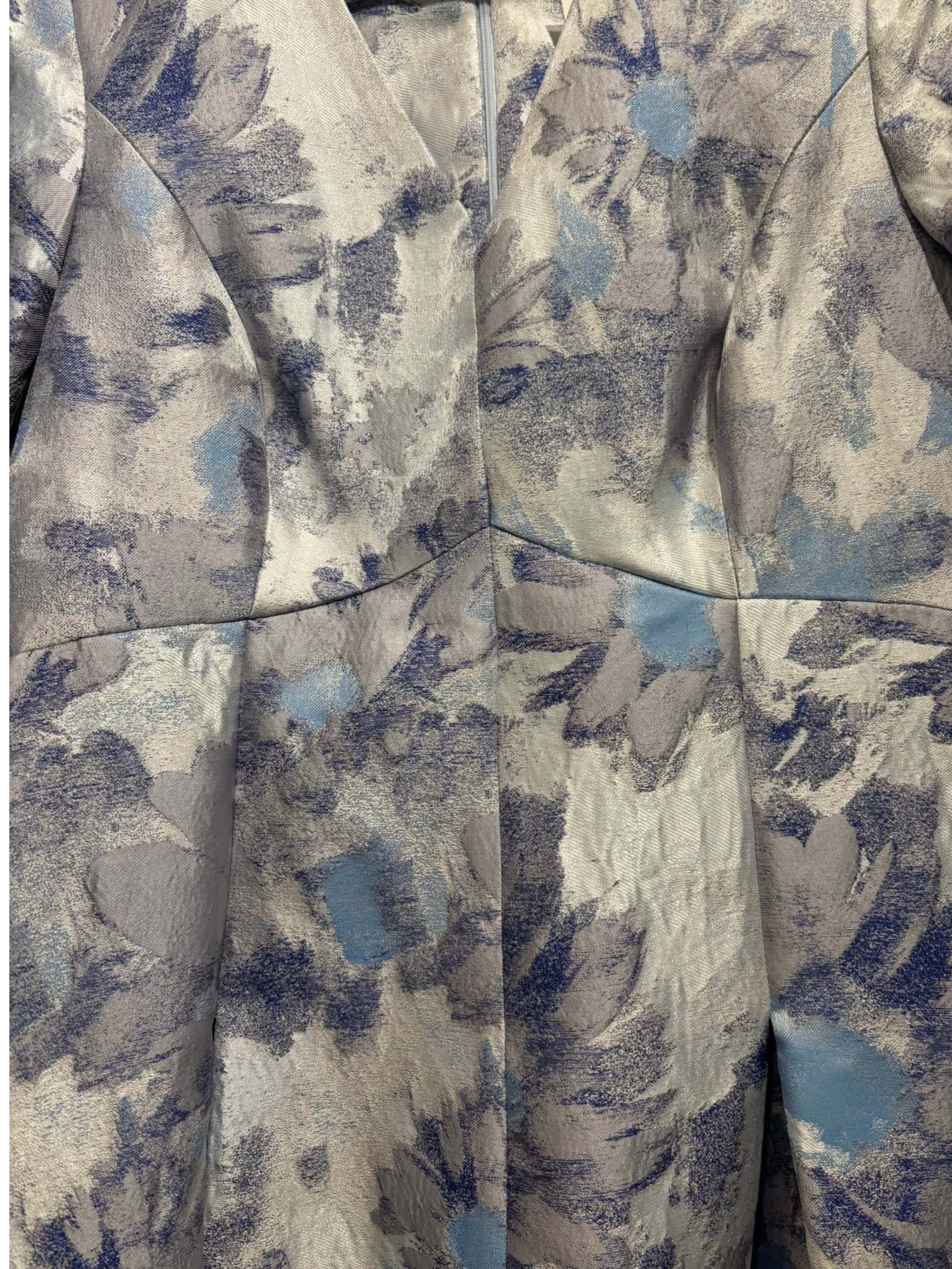 Close-up of a patterned fabric with blue and gray colors.