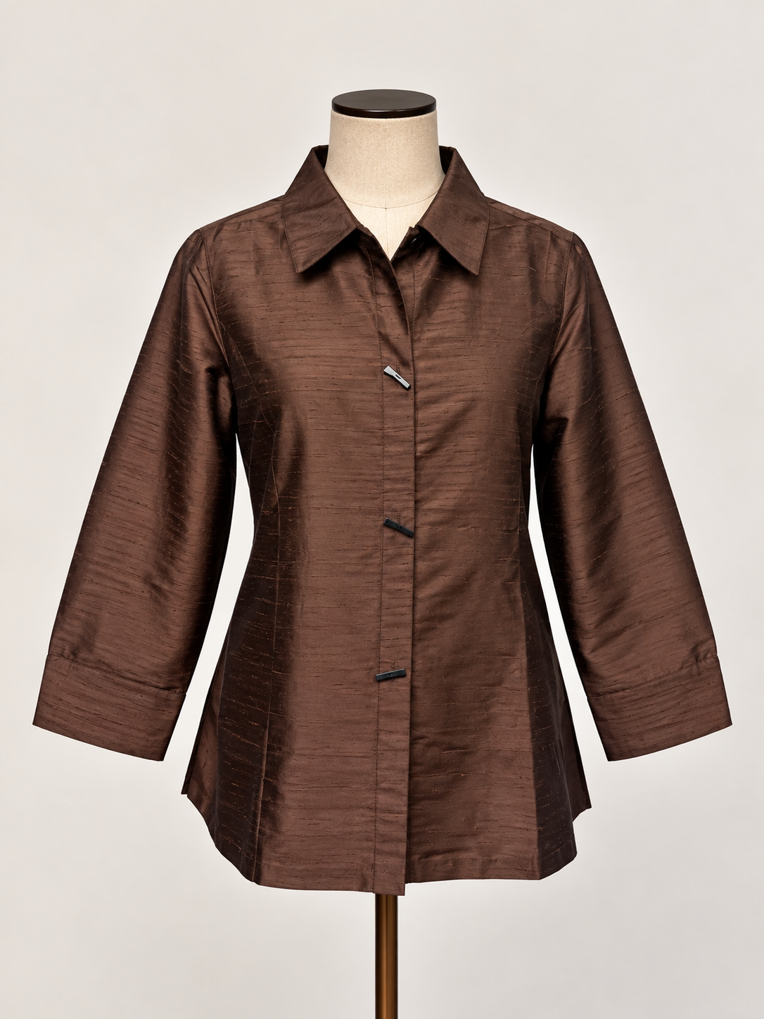 A silk brown textured long-sleeve button-up shirt jacket