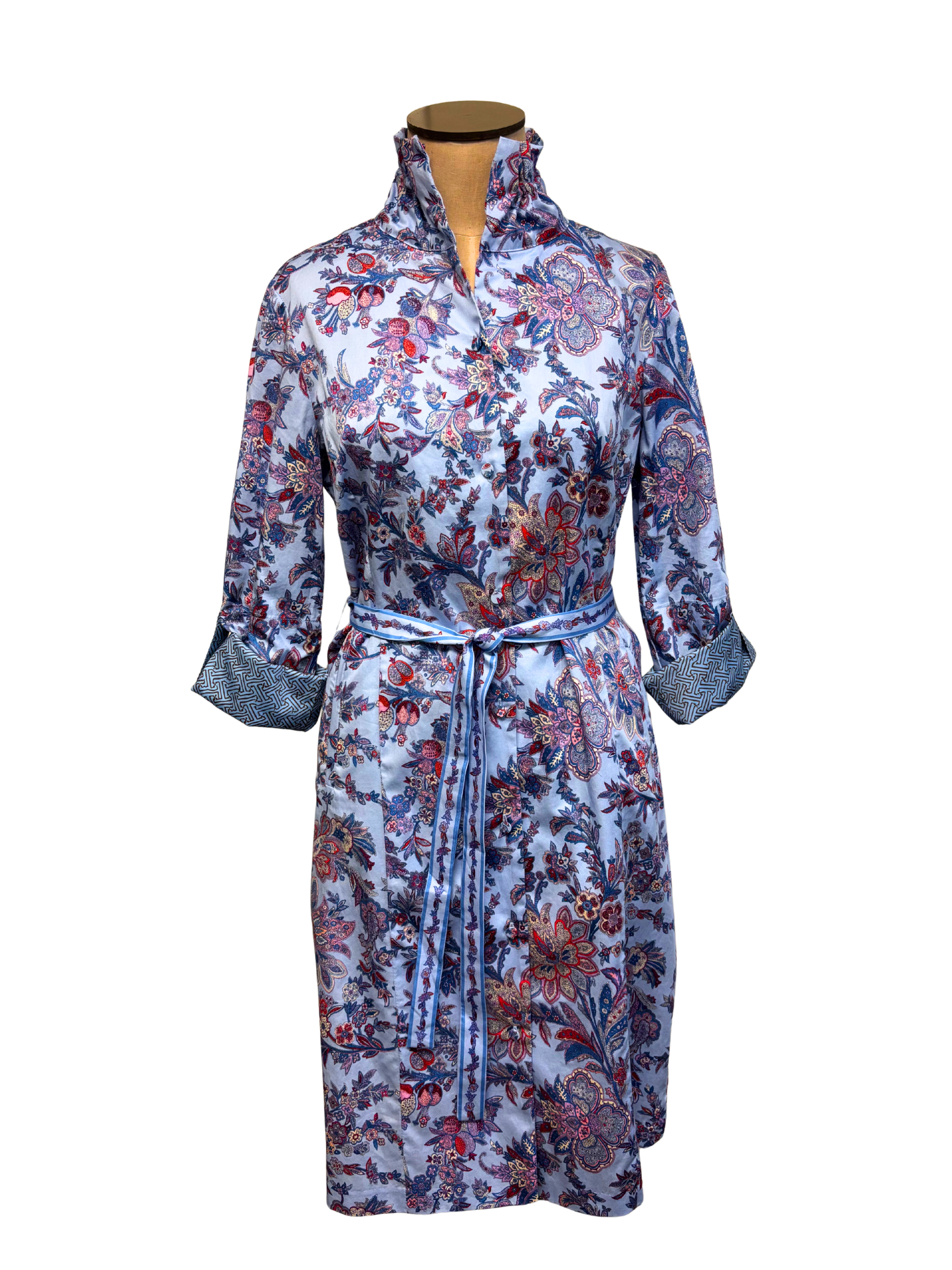 Floral patterned robe on a mannequin against a white background