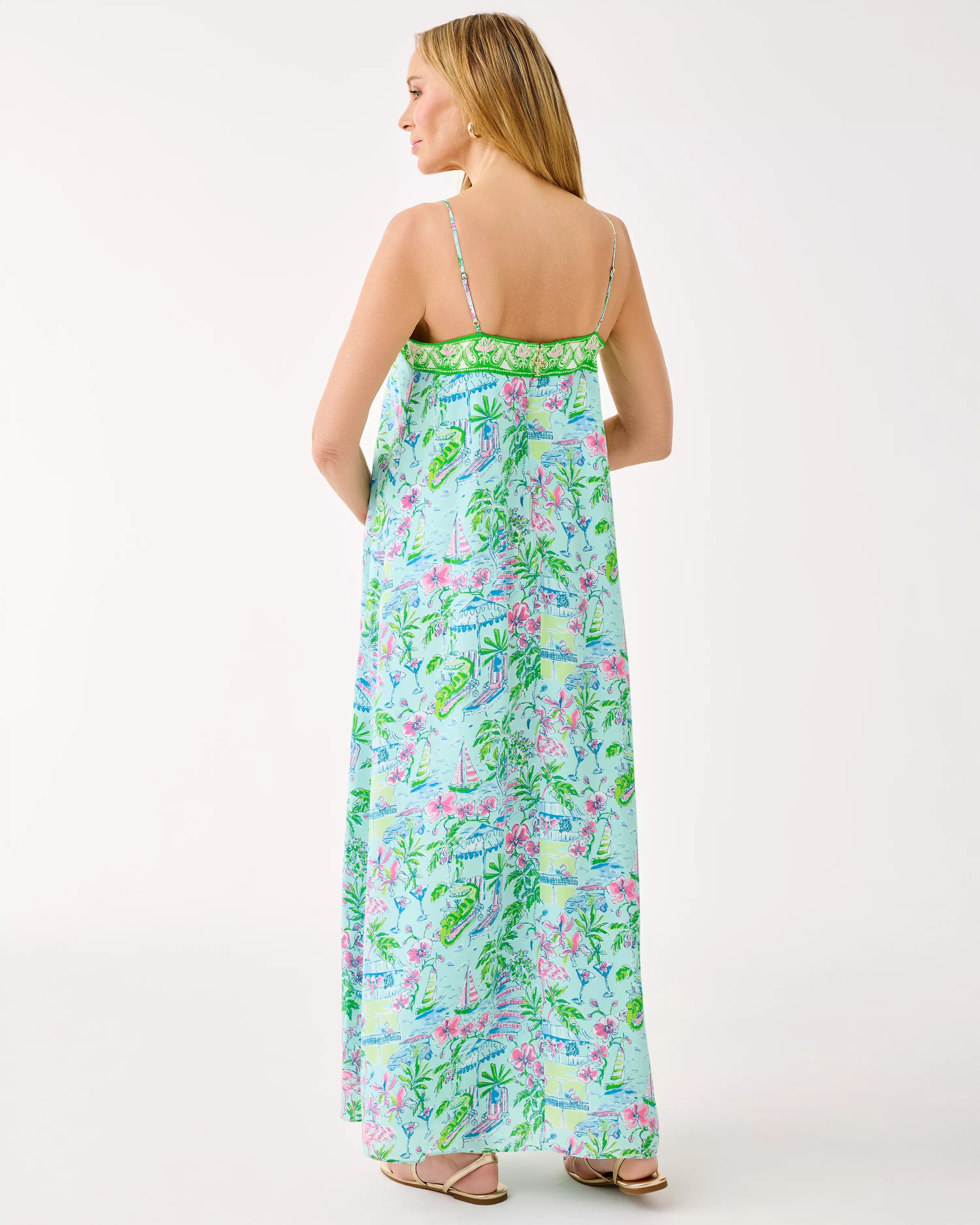 Woman wearing a floral dress on a white background