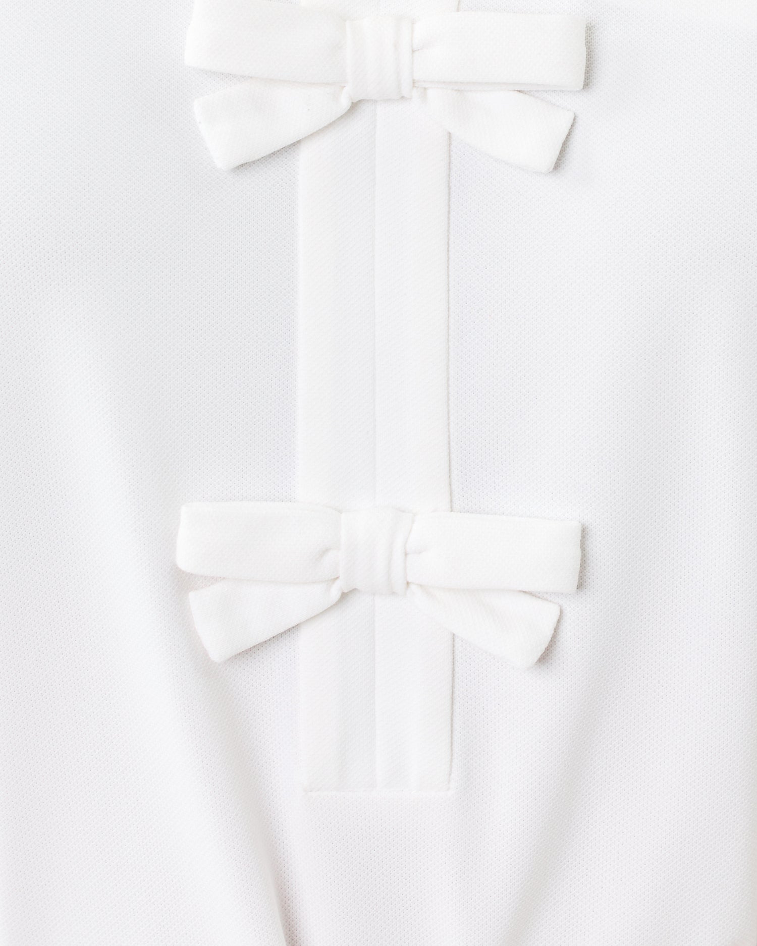 Frida Sleeveless Bow Polo