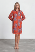 Woman wearing a red patterned dress
