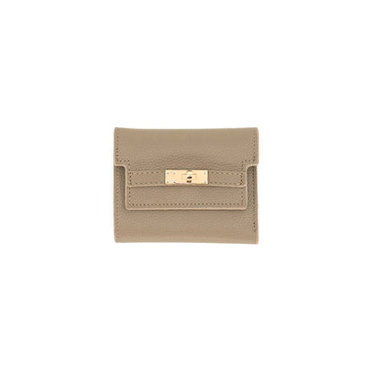 Beige wallet with gold clasp on a white background