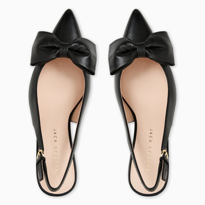 Black bow flats with &