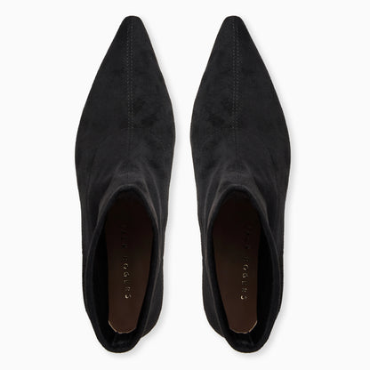 Pair of black pointed-toe shoes on a white background