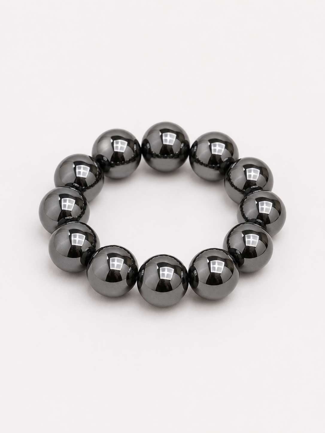 A beaded stretch bracelet made of glossy, round black beads. Uga, georgia football, university of Georgia game day jewelry. 
