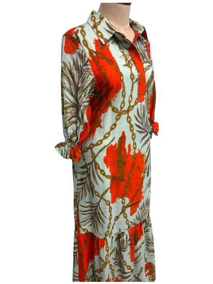 Colorful dress with chain and leaf pattern on a white background