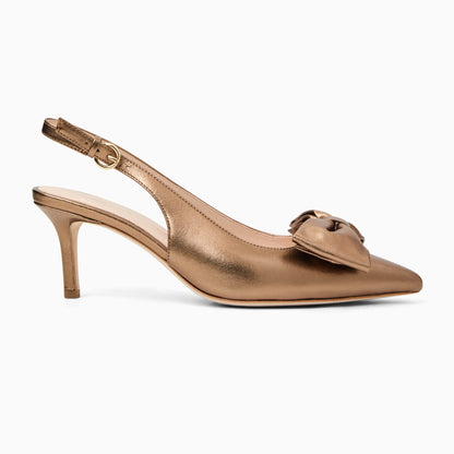 Bronze high-heeled shoe with a bow detail on a white background