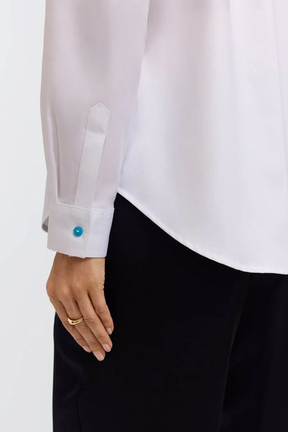 Woman button up white blouse with colorful buttons