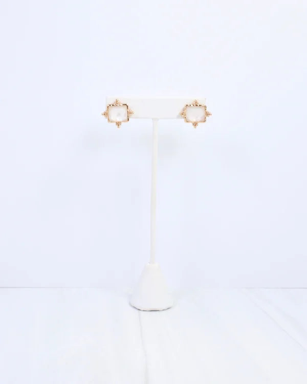 Caroline hill Kerang Square Facited Stud Earring White a pair of gold-tone stud earrings with square white mother-of-pearl centers.