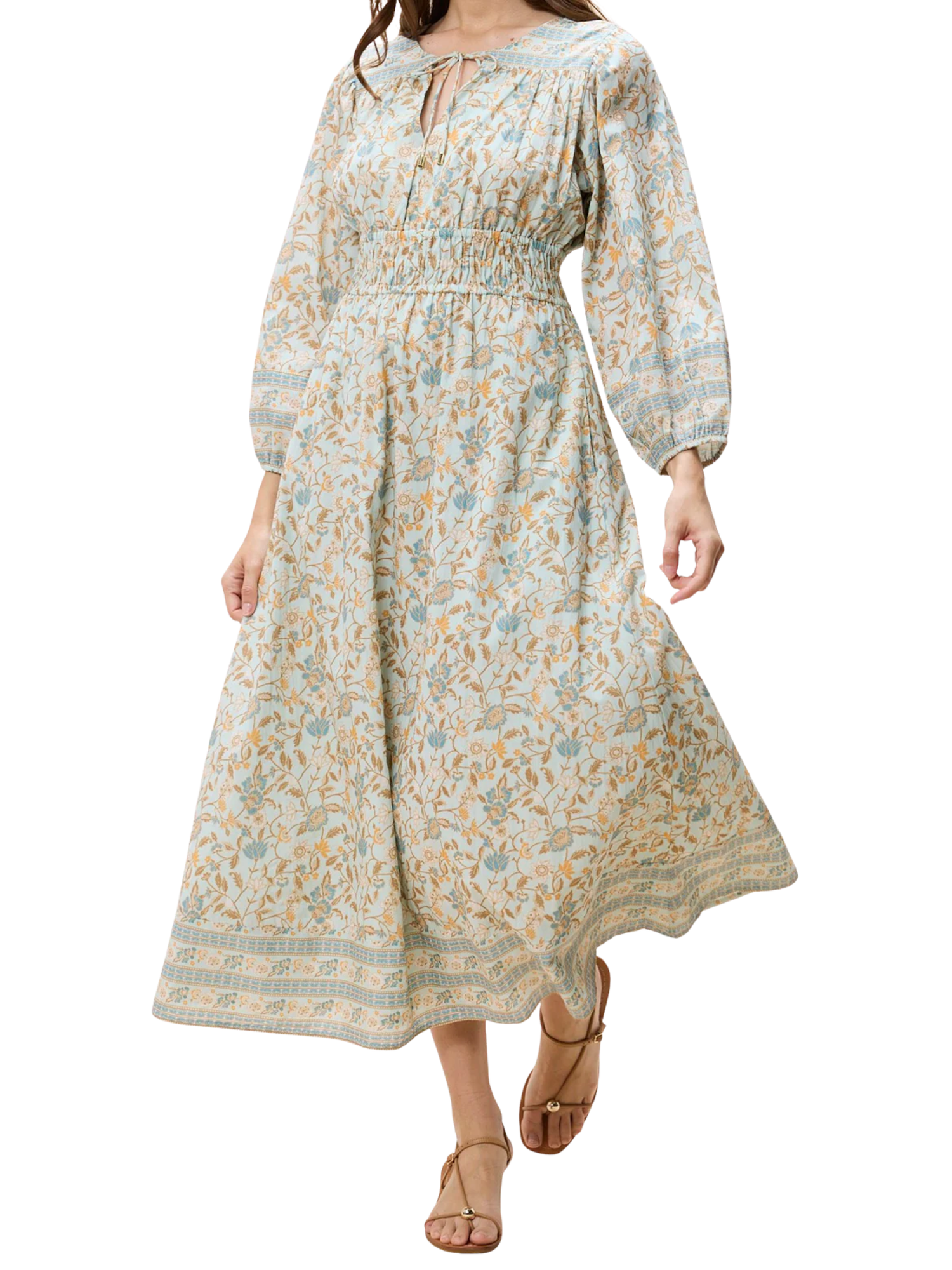 Woman wearing a floral dress on a white background