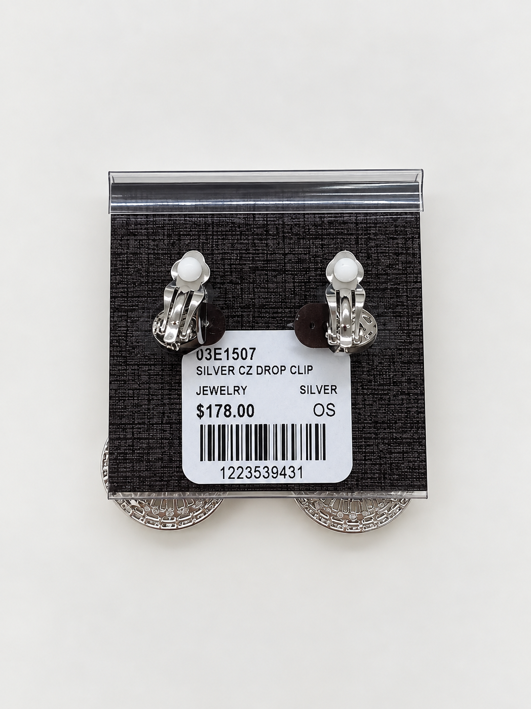 A pair of large silver-tone drop earrings with multiple circular clusters of clear stones, Double Circle CZ Clip-on Earrings