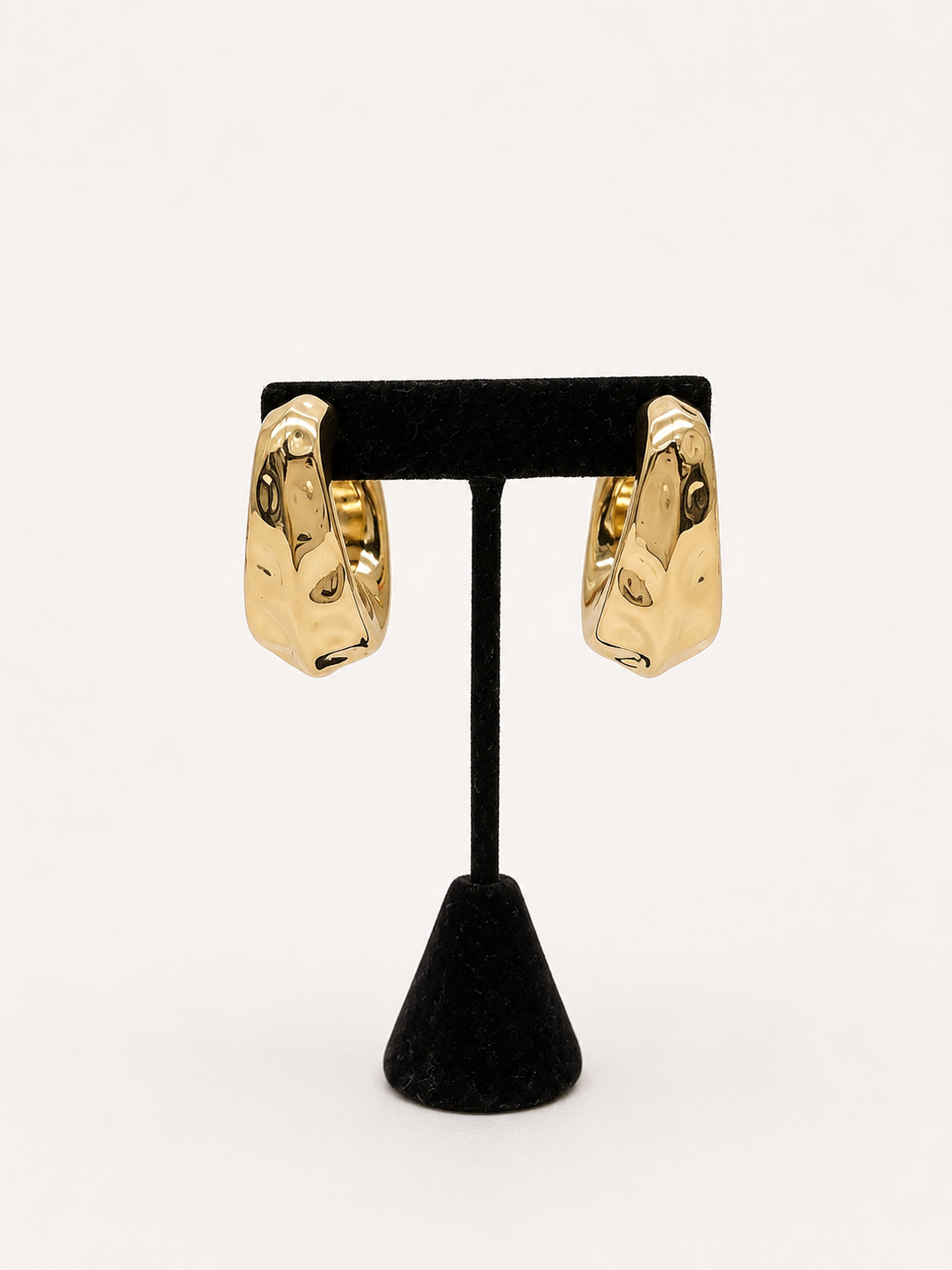Gold Hammered Hoop Earrings pair of chunky gold hoop earrings with a textured, organic shape