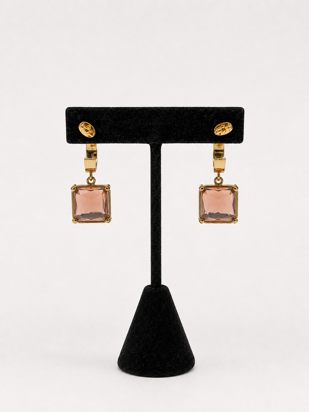 Gold Purple Square Drop Earrings pair of gold hoop earrings with square, faceted dusty rose pink gemstones