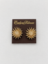 A pair of gold starburst stud clip-on earrings 