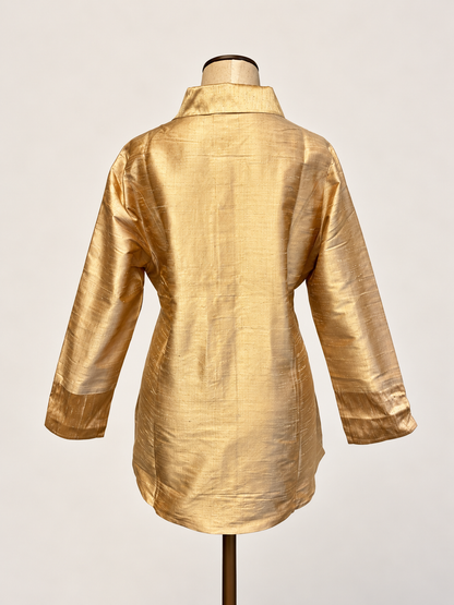 A metallic gold silk long-sleeve tunic top with a high collar