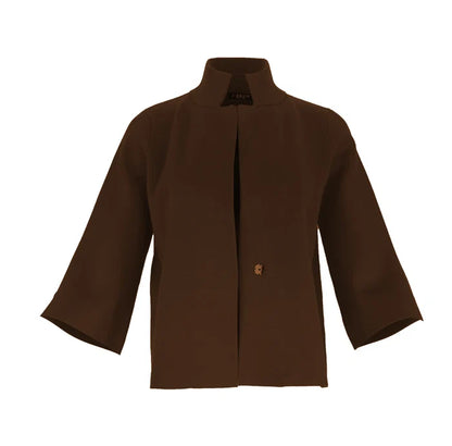 A woman modeling a brown cropped cape jacket with wide three-quarter sleeves by Jenvie The Bristol Jacket in French Toast Chocolate Brown