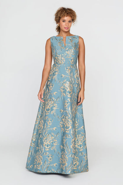 Woman wearing a blue floral dress on a white background