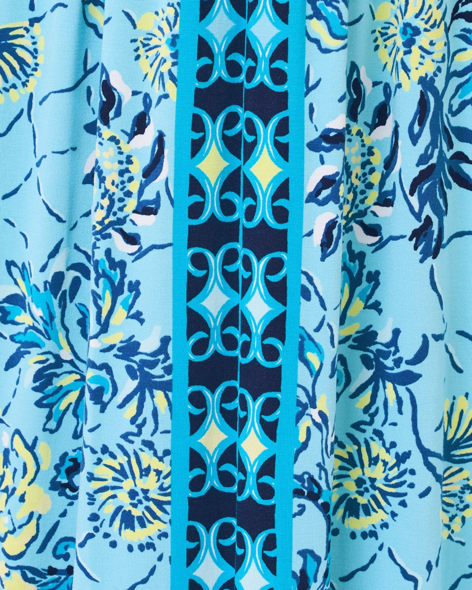 Striped fabric with blue and yellow patterns on a blue background