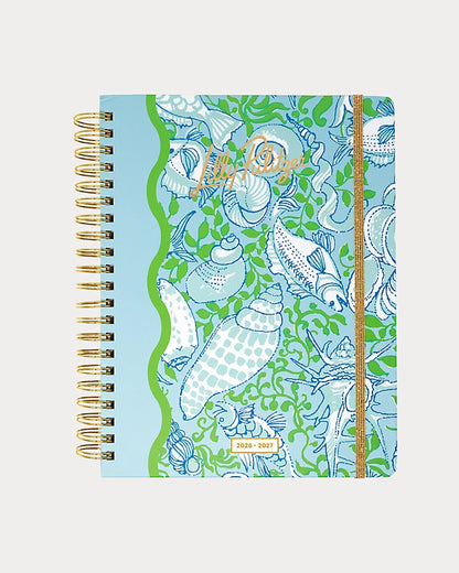 Lilly Pulitzer 2026-2027 17 Month Jumbo Agenda Spiral-bound planner with a decorative cover featuring sea shells and fish in the Color Day Dream Blue Throw Me A Line