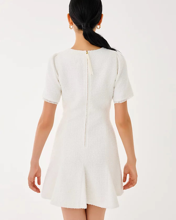 White dress worn by a person on a white background