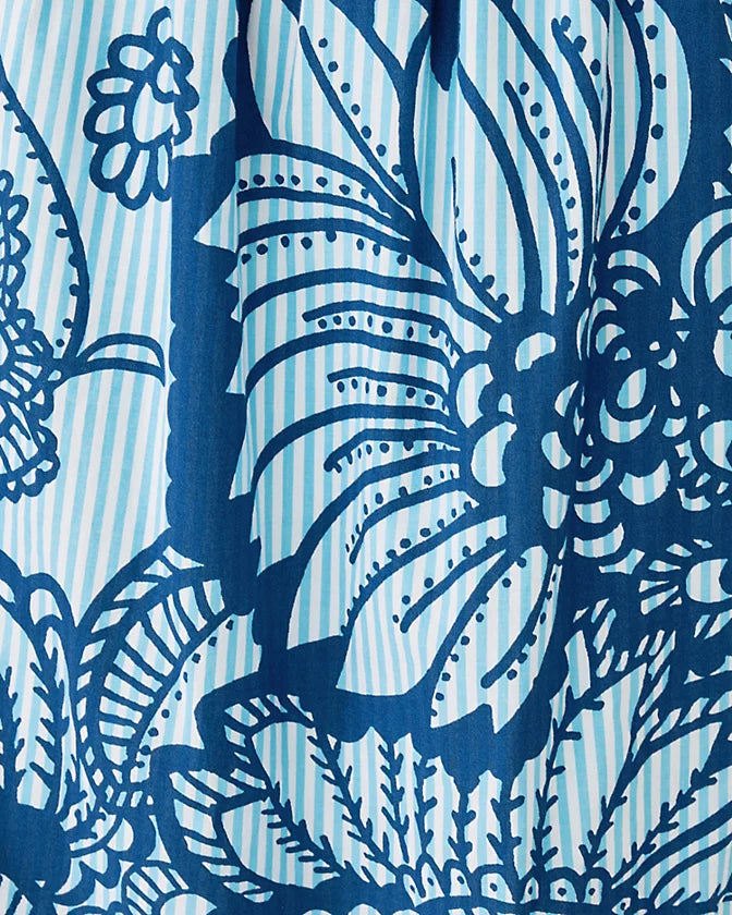 Blue floral and striped pattern on a blue background