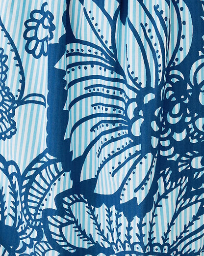 Blue floral and striped pattern on a blue background