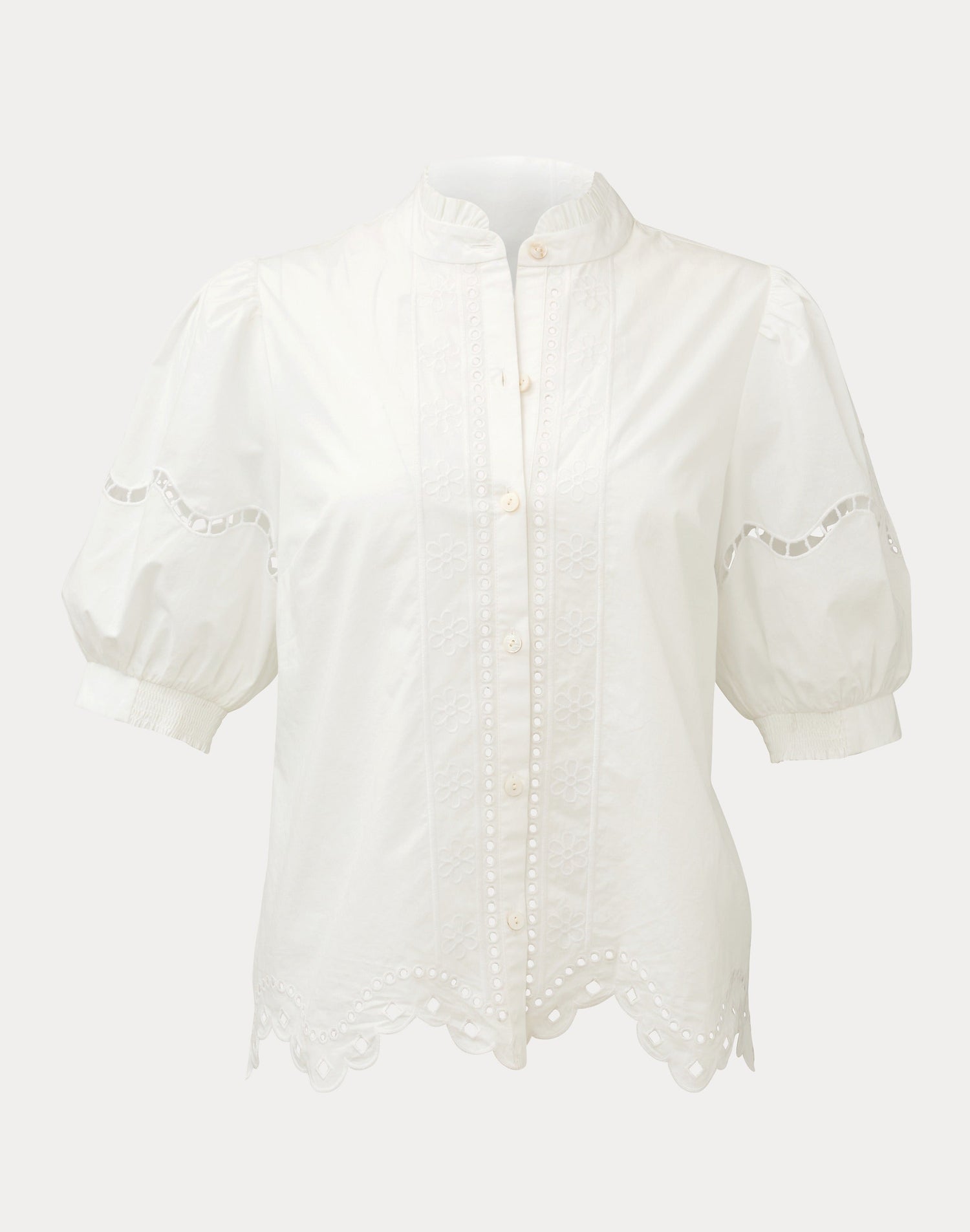 White blouse with lace details on a white background