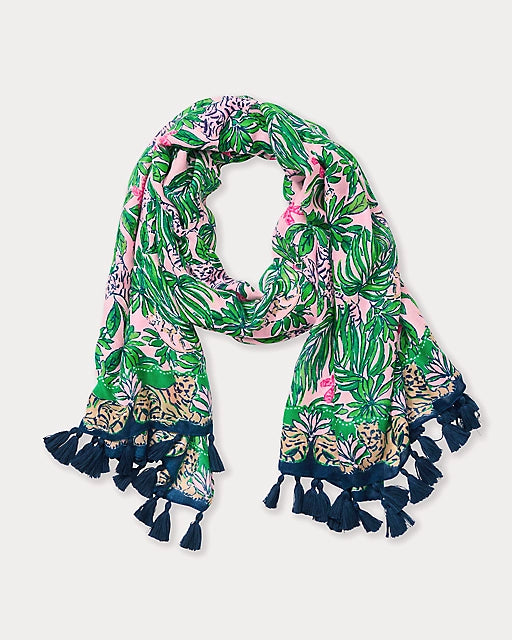 Tropical patterned scarf with tassels on a light gray background