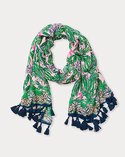 Tropical patterned scarf with tassels on a light gray background
