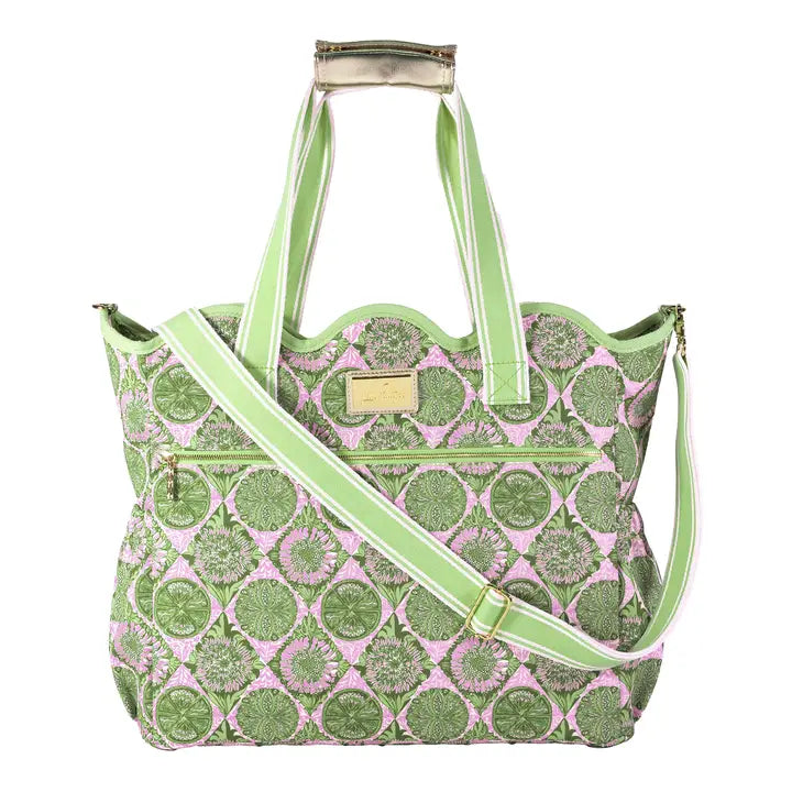 Lilly Pulitzer Scallop Cooler Tote, Tropical Tiles a cooler tote bag with a green and pink floral pattern, featuring light green handles and a matching shoulder strap with white stripes