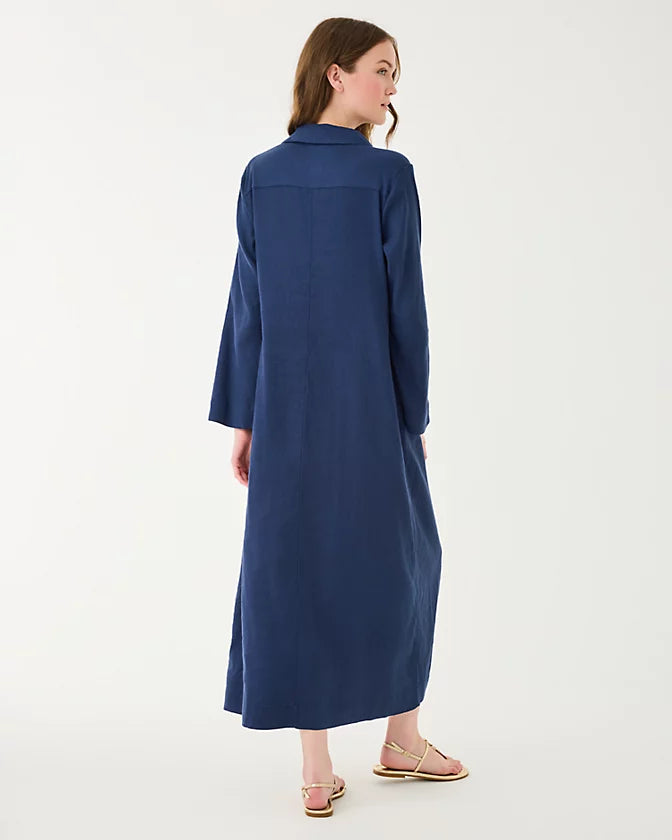 Woman wearing a blue dress on a white background