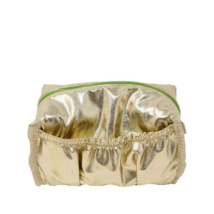 Gold metallic pouch with green zipper on a white background
