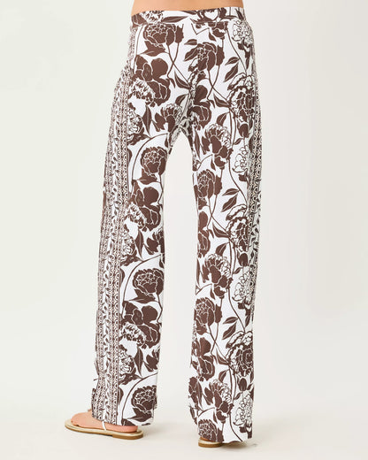Lilly Pulitzer UPF 50+ 32" Demia High Rise Palazzo Pant in  Resort White Marni Engineered Chillylilly high-waisted, wide-leg pants with a brown and white floral print and a patterned side stripe