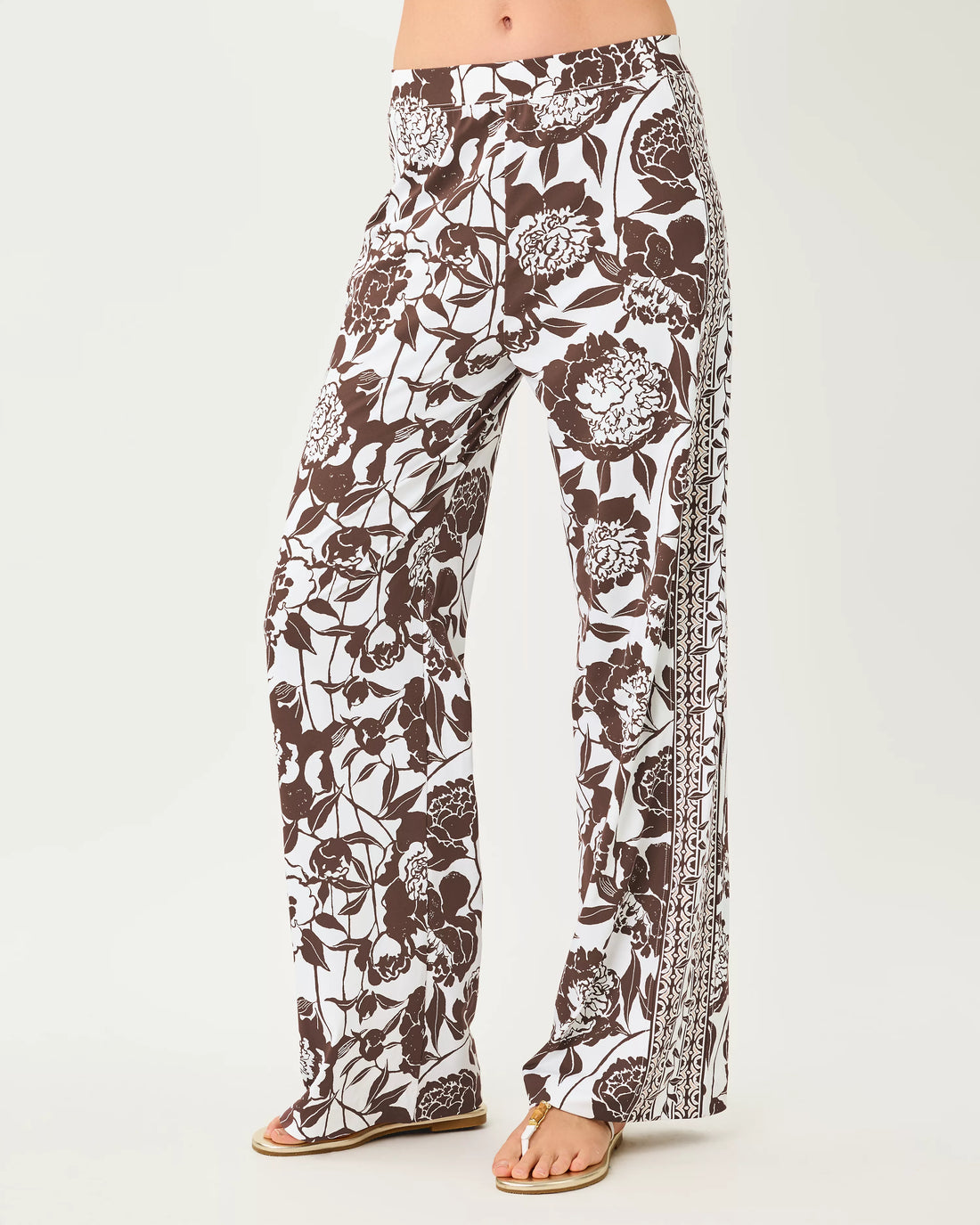 Lilly Pulitzer UPF 50+ 32" Demia High Rise Palazzo Pant in  Resort White Marni Engineered Chillylilly high-waisted, wide-leg pants with a brown and white floral print and a patterned side stripe