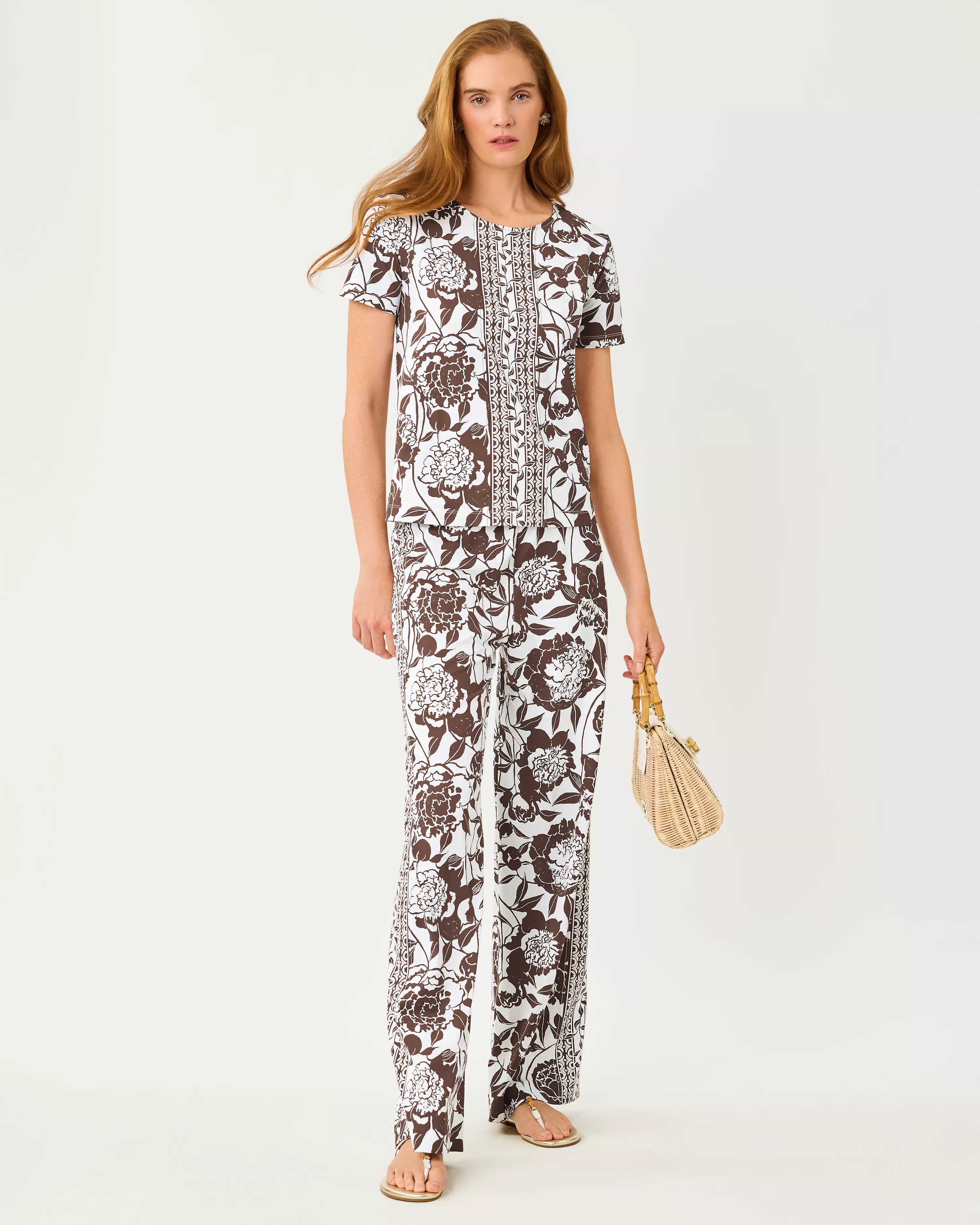 Lilly Pulitzer UPF 50+ 32" Demia High Rise Palazzo Pant in  Resort White Marni Engineered Chillylilly high-waisted, wide-leg pants with a brown and white floral print and a patterned side stripe