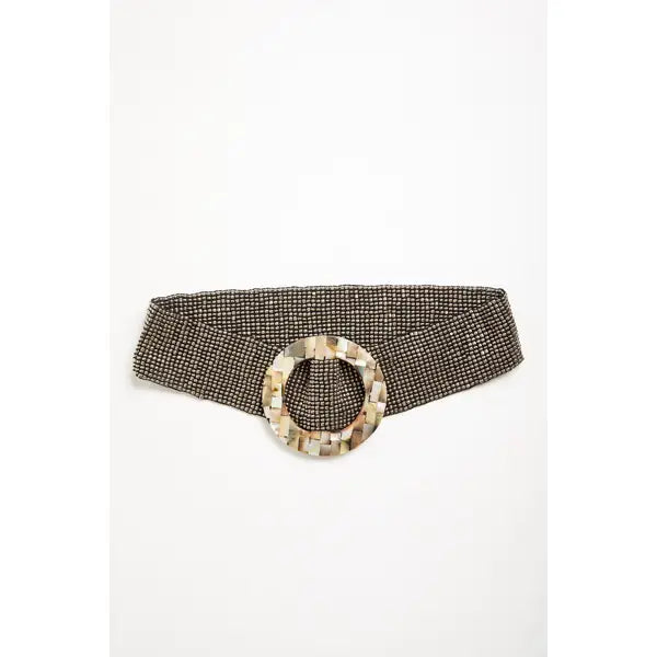 A wide waist belt featuring a textured, woven black and beige pattern with a large circular buckle made of natural mother-of-pearl shell pieces by  Mare Sole Amore Silver Oz Slip On Stretch Belt 