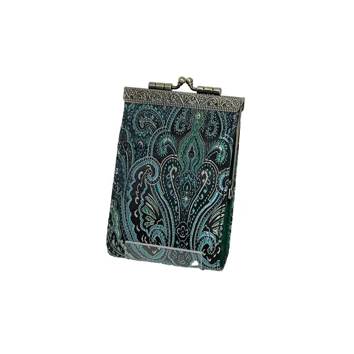 Vintage-style clutch with paisley pattern on a white background