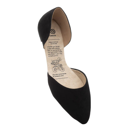 Black pointed-toe shoe with a brand label on a white background