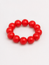 A beaded stretch bracelet made of glossy, round red beads. Uga, georgia football, university of Georgia game day jewelry. 